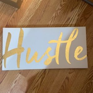 Hustle sign
